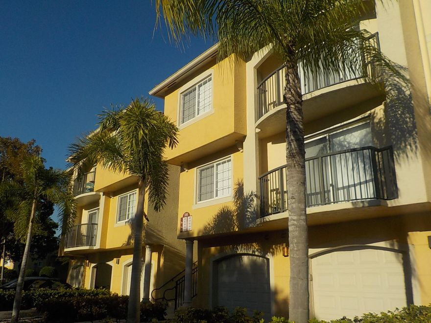 Attention ''fixer-uppers'' looking for an opportunity to own a rare 2/2 with 1-car garage and water view in Grandview at Crestwood!  Same size units with the garage are selling at higher prices than the asking price of this condo.  The floorplan includes a spacious dining/living area, kitchen w/granite counters, outdoor balcony w/lake view and 2 master bedroom suites and walk-in closets on the 2nd level w/a 1-car garage & laundry on the lower level.  Well-maintained community offers electronic security gate, clubhouse with resort style pool & tennis & basketball onsite too. The location is optimal for ease to Southern Blvd. commuting options & shopping/dining, parks and schools in Royal Palm & Wellington. HOA fees include basic cable and water. Sold as-is.