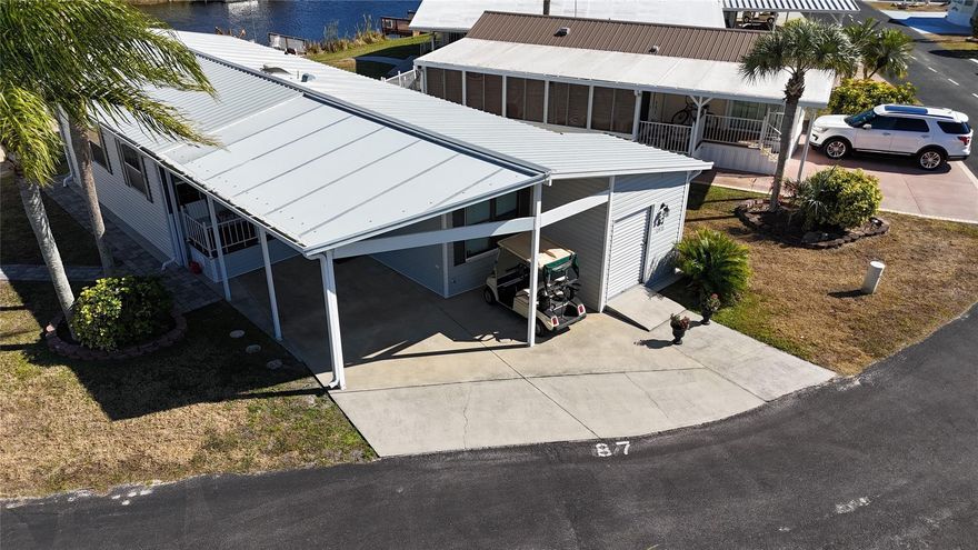 Blue Cypress Charmer! 1 bed 1 & half bath located on a small Lake with a dock for fishing & relaxing! This open-concept home is fully renovated with a new kitchen! The Florida room has a sofa bed for guests w/privacy. New Laminate flooring through-out, both baths are fully tiled with glass shower enclosure, skylight for natural lighting. Additional highlights include court yard with pavers, covered carport with golf cart parking. A small attached utility garage, new water heater, plumbing replaced and a 3 year old metal roof. Blue cypress is a leisure, resort-style community featuring pickleball courts, a huge clubhouse, and a 9 hole 3 par golf course. Located on Lake Okeechobee, enjoy world famous fishing, social activities and relaxed Florida living at its best. Shopping & dining nearby.