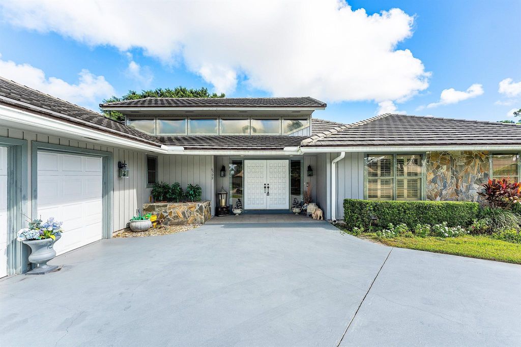 Photo of 6599 Eastpointe Pines Street, Palm Beach Gardens, FL 33418 (MLS # R11130676)