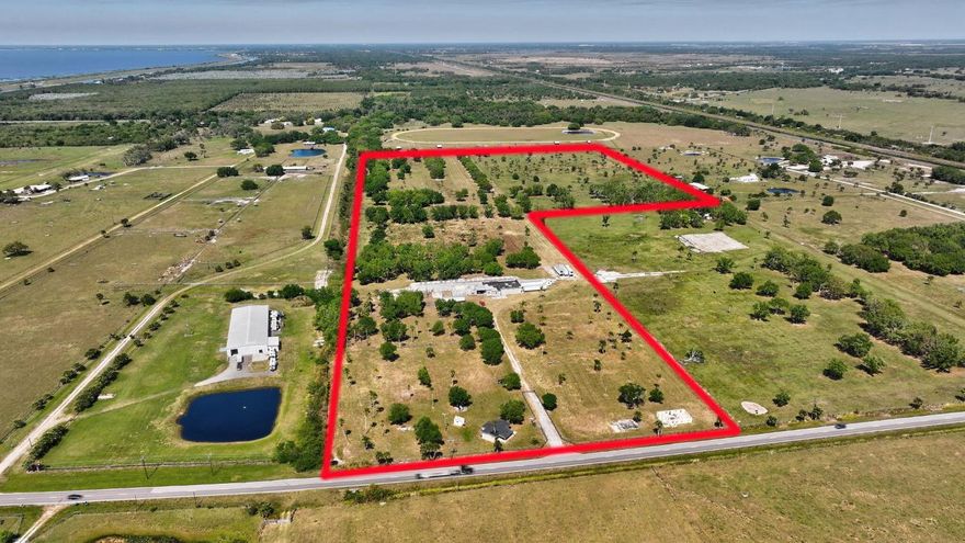 Amazing Opportunity - Wide Open Space on 55 Acres, Home Features 2 Bedroom 1 Bath with Tile Flooring, Kitchen with Lots of Cabinets, Impact Windows, Water Filtration System, Spacious Covered Porch, Property Encompasses 55 Acres Cleared and Fully Fenced, Storage Buildings, 6 inch Well, 3 Phase Electric, Minutes to Lake Okeechobee, 20 Minutes to Stuart, Must See