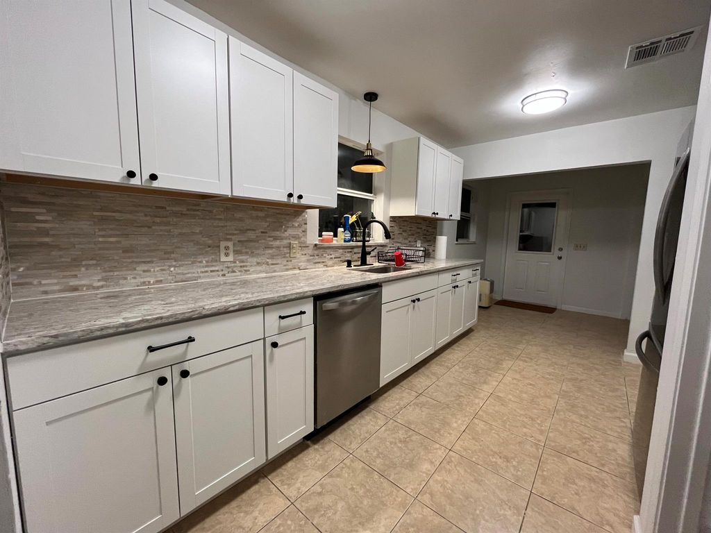 Photo of 1332 SW 28th Street, Palm City, FL 34990 (MLS # R10983576)
