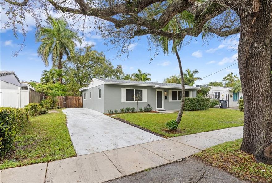 The PERFECT space for your family! HUGE fenced in backyard with lots of privacy, just add a table and a grill. Plenty of space to add a pool! This bright and airy home offers an open floor plan and plenty of storage. Freshly painted interior & exterior, BRAND NEW floors, and a brand new refrigerator. You will LOVE the large open kitchen with oversized eat-in countertop. Rest easy with the security of IMPACT WINDOWS all around and a newer roof (2018). The gate off the driveway opens to a slab in the backyard perfect for secure boat or RV storage. Easy access to I-95 and the Turnpike. Only 10 minutes to Hollywood Beach Boardwalk. NO HOA!! This will not last long!OPEN HOUSE SATURDAY JAN 29 11:00-1:00