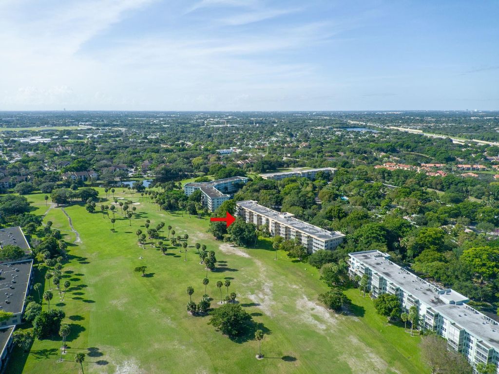 Photo of 804 Cypress Grove Ln #302, Pompano Beach, FL 33069 (MLS # F10534074)