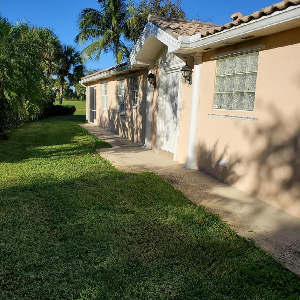 Photo of 1352 Saint Lawrence Drive, Palm Beach Gardens, FL 33410 (MLS # R10674734)