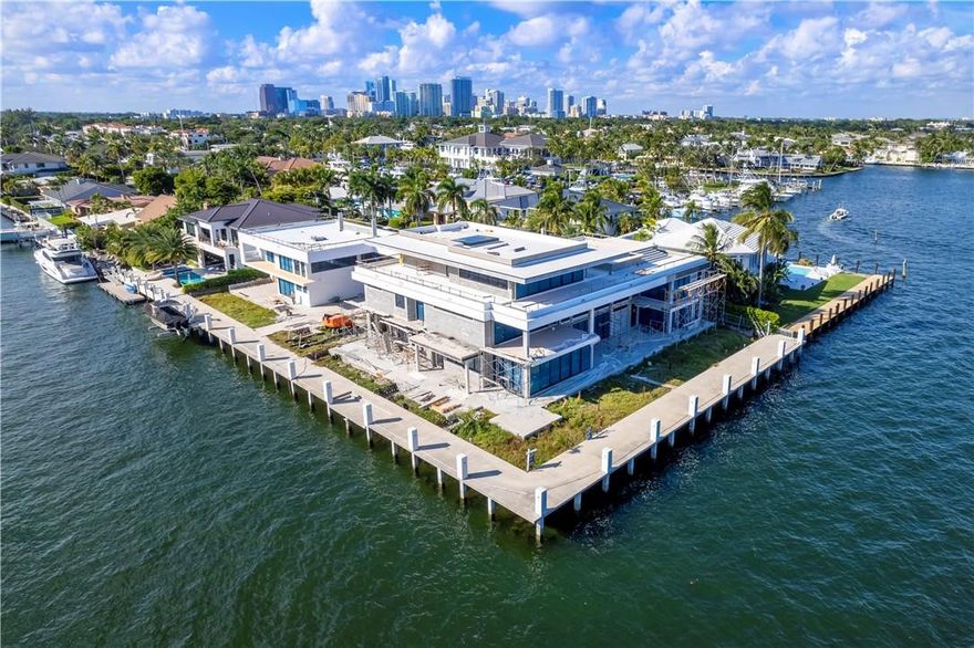 Fort Lauderdale’s Epic Luxury Waterfront Estate at the Ocean-to-Intercoastal Gateway to the Yacht Capital of the World. Perfectly sited on more than 1/2 acre is the one-of-a-kind 3-story modern masterpiece with over 15,000 square feet of indoor & outdoor elegant, sophisticated living. Over 345’ of deep water dockage. Straight line dockage for mega yacht. Garage storage for 16-20 cars. Breezeway connected  Guest House.  Spectacular 180 degree water views of widest part of Intracoastal only minutes to the ocean.  Resort style pool plus second spa-style pool on 3rd floor deck.  Construction is well underway!  Perfect time to select your own fit and finishes. Details coming soon. www.LauderdaleYachtHaven.com