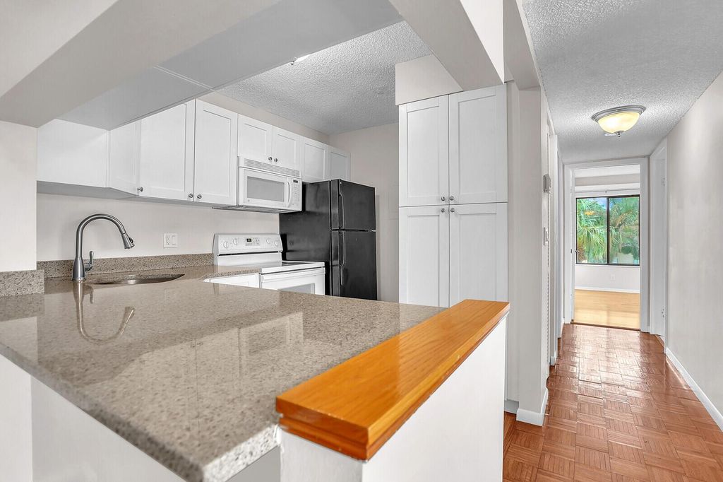 Photo of 708 Sunny Pine Way #B3, Greenacres, FL 33415 (MLS # R11132361)