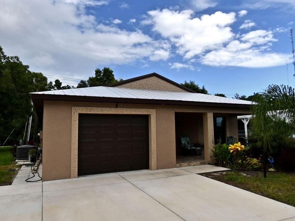 Photo of 8 Mediterranean Boulevard N, Port Saint Lucie, FL 34952 (MLS # R11168007)