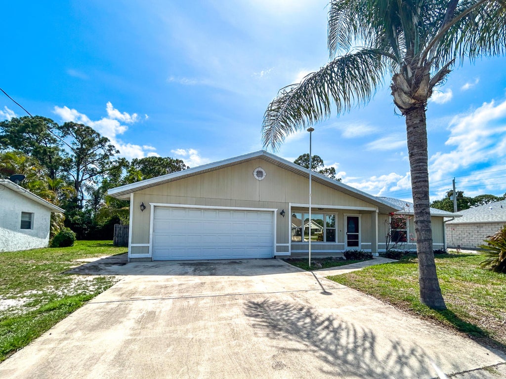 Photo of 1712 SW Airoso Boulevard, Port Saint Lucie, FL 34984 (MLS # R11095253)