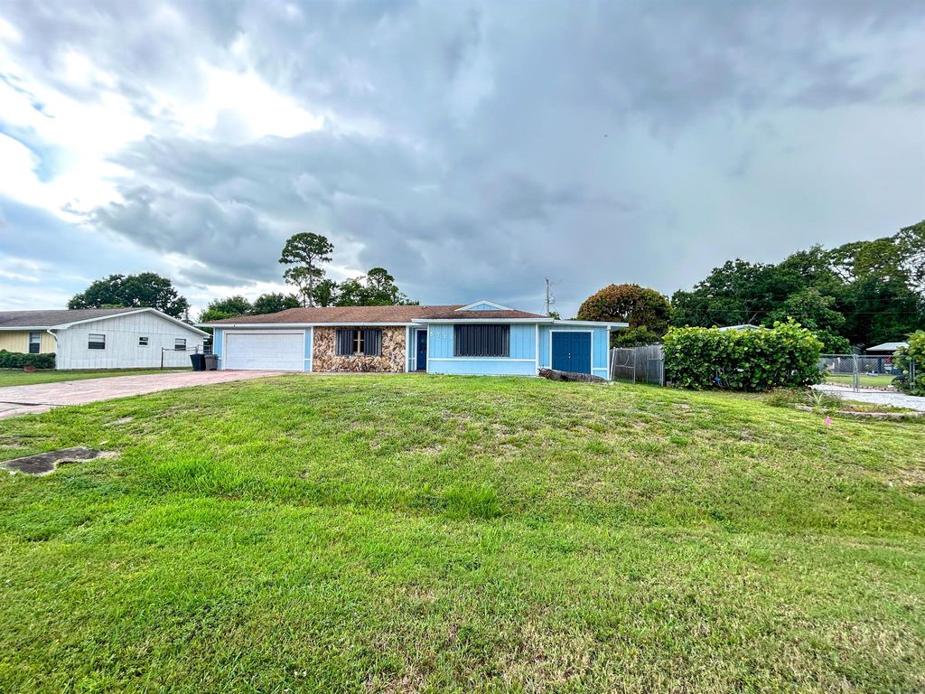 Photo of 5711 Killarney Avenue, Fort Pierce, FL 34951 (MLS # R11096756)