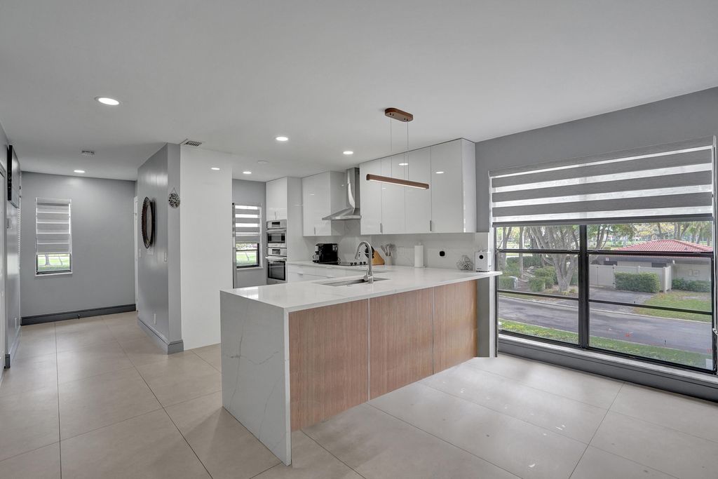 Photo of 21675 Tall Palm Circle #2b, Boca Raton, FL 33433 (MLS # B26013021)