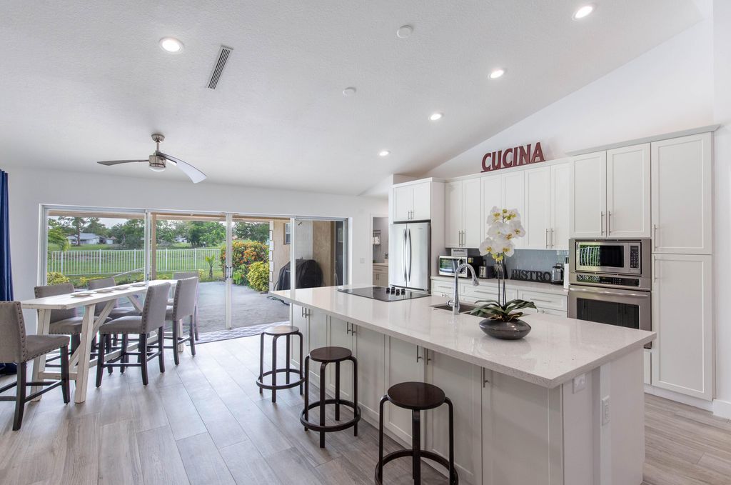 Photo of 1327 Pine Valley Drive, Wellington, FL 33414 (MLS # B26012546)