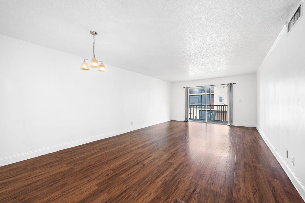 Photo of 3000 Riverside Drive #209-1, Coral Springs, FL 33065 (MLS # B26081278)