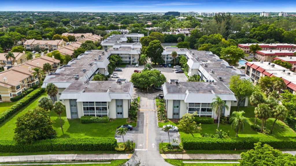 Photo of 3000 Riverside Drive #209-1, Coral Springs, FL 33065 (MLS # B26081278)