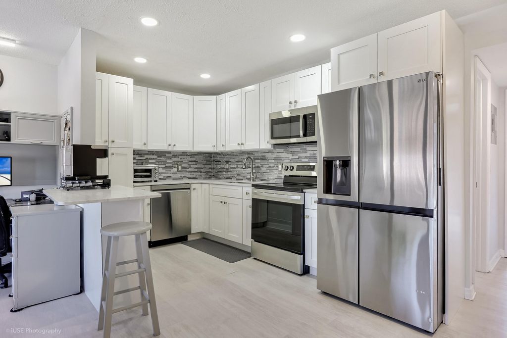 Photo of 94 Hastings, West Palm Beach, FL 33417 (MLS # B26003069)