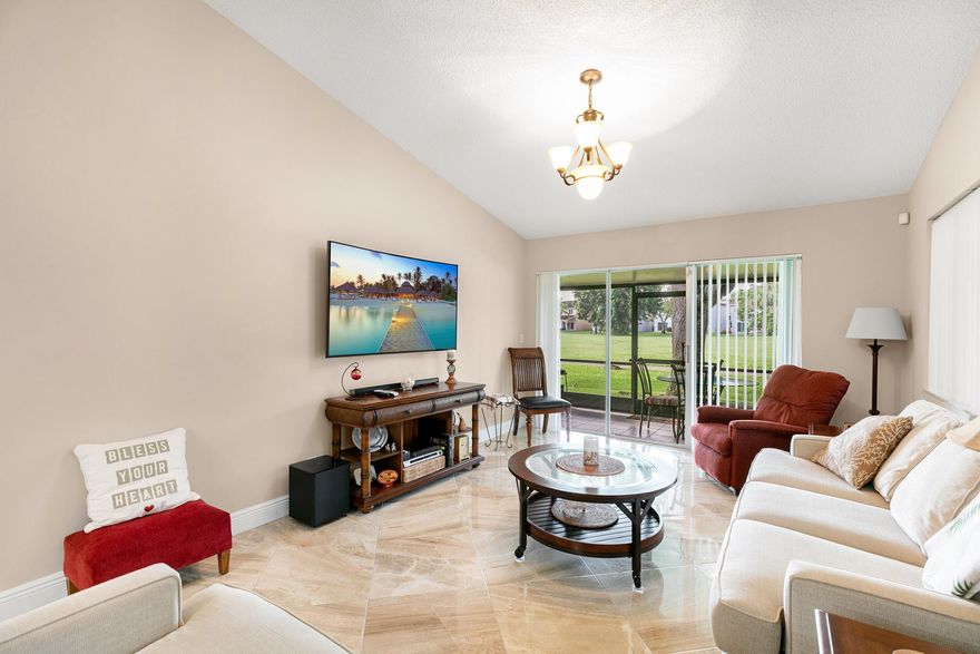 Located on the former Carolina Club Golf Course, this 3-bedroom, 2-bathroom one level / floor townhouse is an updated and well-kept property with vaulted ceilings, upgraded cabinetry and appliances, and fairway views. The spacious kitchen features quartz countertops and island, connecting to the dining room with an alcove for storing items or displaying art. Entertain guests in the spacious living room or in the adjacent screened-in porch on the back of the house. Although the course is no longer in use, residents get to enjoy the privacy and beautiful scenery of living on a golf course without the fear of rogue golf balls crashing into the house. With in-unit laundry and a one-car garage with storage, this property has everything you need to live in comfort and tranquility.