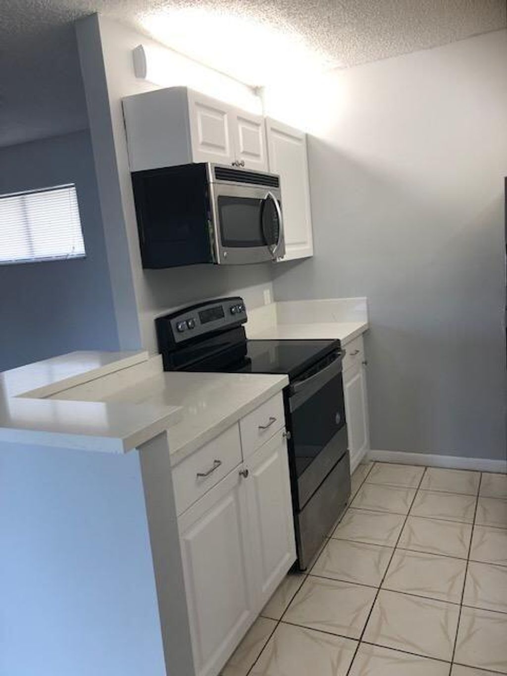 Photo of 14 Crossings Circle #G, Boynton Beach, FL 33435 (MLS # R11108055)