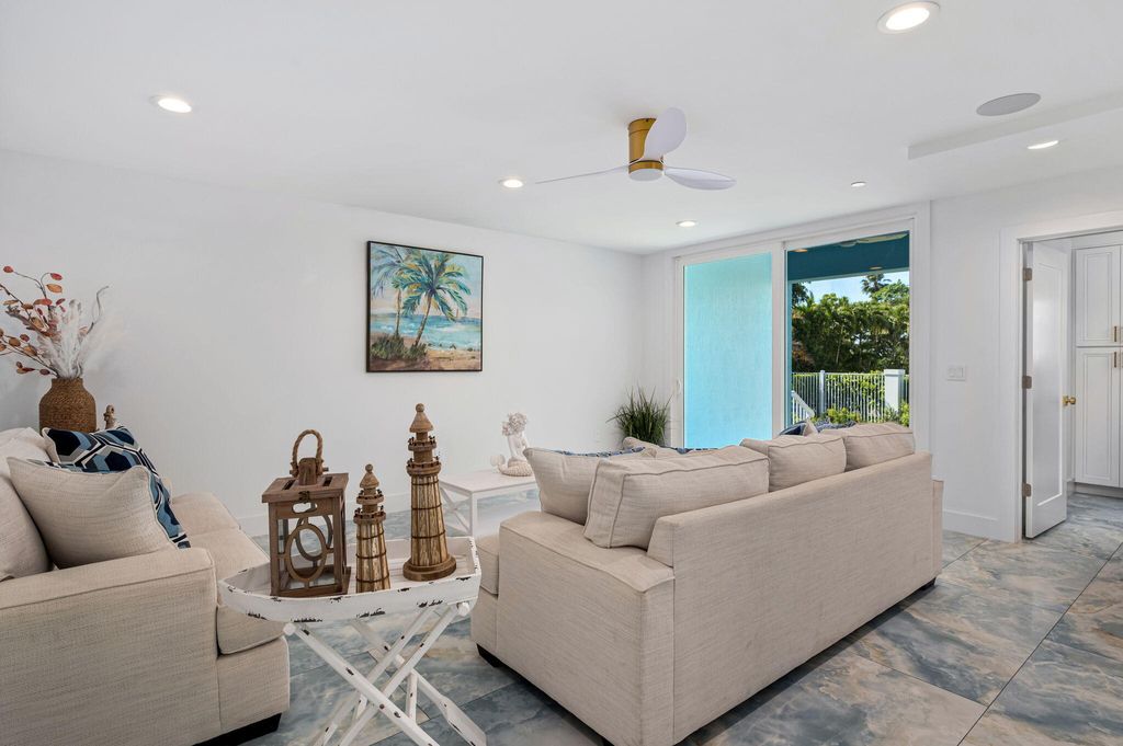 Photo of 107 Desota Street, Hutchinson Island, FL 34949 (MLS # R11168698)