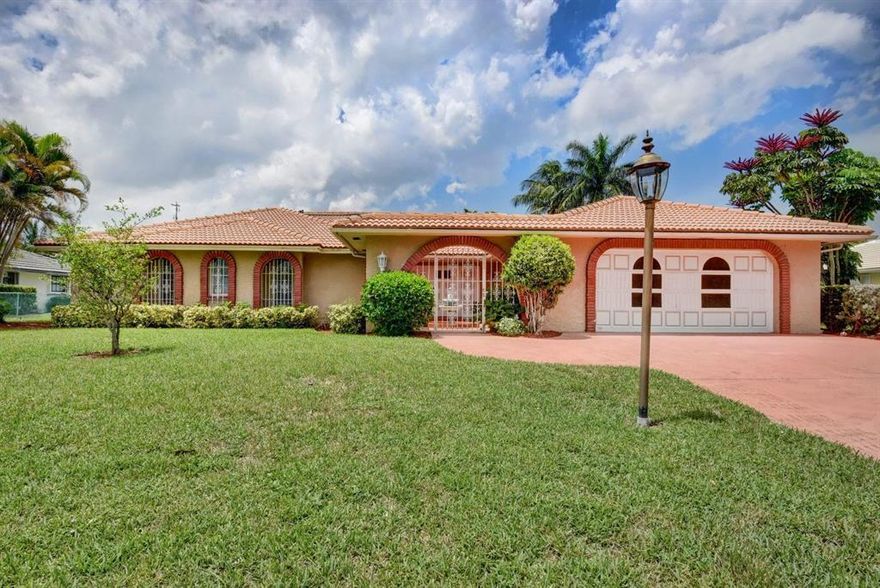 In the City of Atlantis this beautiful upgraded Mediterranean style home offers 4 bed 3 bath and bonus room that can be as used and on office, large kitchen and living room, 2 car garage. Cabana bath Large lot with pool and covered and screened patio.  Home has recent upgrades that include brand new hurricane proof windows, new double door entry, new garage door, new water heater, new upgraded electric, a/c, newer roof. 
Nice and bright open floor plan with with plenty of room for everybody. Beautiful yard on a canal and has fruit trees. Atlantis is gated city that offers tennis and pools and it has golf course. Near all major highways and shopping, dining and banking. Mediterranean style pool home in the City of Atlantis. Home has recent upgrades that incluThis Gated community offers golf but it's not mandatory. This beautifully renovated home futures 4 bed, 3 bath, bonus room, 2 car garage and large 1/3 acres lot with different fruit trees and beautiful landscaping. RECENT Us being upgraded. Master bedroom suite has his/hers vanities, roman tub, shower and walking closet all in neutral tones. Second and third bedroom share upgraded bathroom with his/hers vanities and shower in neutral tones. Cabana bath futures Sauna and largo pool deck is surrounded by white picket fence and it has covered patio. Kitchen futures island and has a lot's of counter space and gas stove as well pass trough window and large dining room. NEWER ROOF and pool has solar heater.

Supplement Remarks (10,000 chara