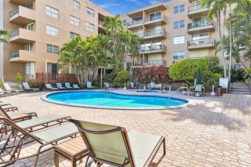 GREAT OPPORTUNITY FOR INVESTORS or someone looking for the perfect vacation spot! Waterfront Community. This condo offers SO MUCH for so little... 1) Multiple Parking Spots. 2) PETS WELCOME! 3) Gated Private Beach Access w/ parking, pavilion, BBQ Grills, picnic tables & showers. 4) Boat Dockage Available for up to a 28 ft Boat. 5) You can rent the property out immediately for a minimum of 30 days and up to 12 x per year. 6) Affordable Maintenance Fees. 7) Washer & Dryer in Unit.  8) Centrally Located to the Pompano Pier & Lauderdale by the Sea Pier. 9) Freshly painted.  Resort-style pool area w/ Jacuzzi & BBQ grills overlooking intersecting canals. You can walk, drive or hop in the free shuttle to visit Lauderdale-by-the-Sea or newly developed Pompano Pier district for shopping or dining.