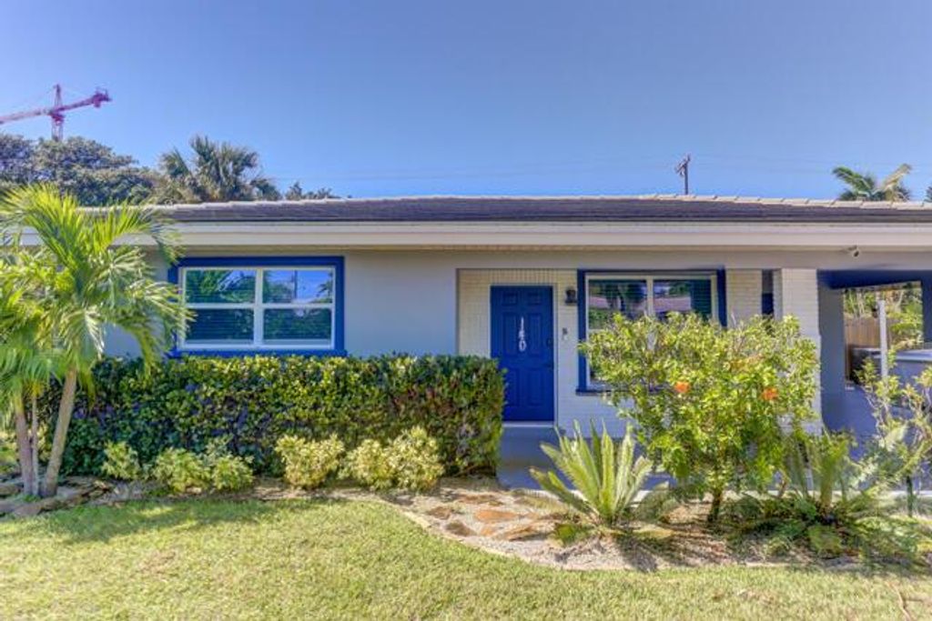 Photo of 140 Date Palm Drive, Lake Park, FL 33403 (MLS # R11062873)