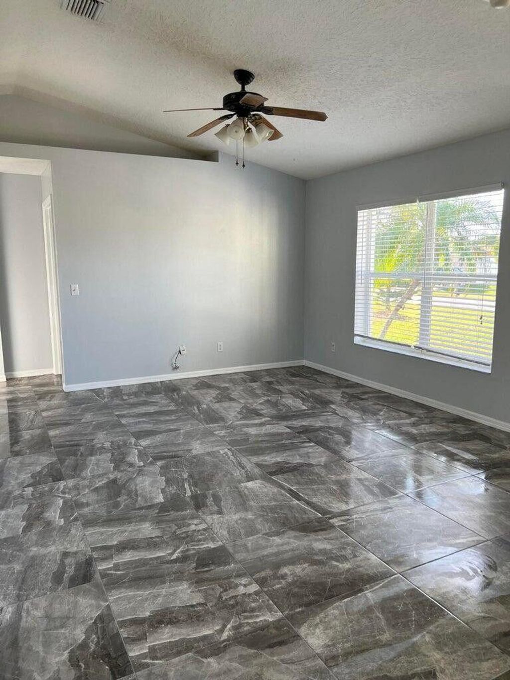 Photo of 774 SE Atlantus Avenue, Port Saint Lucie, FL 34983 (MLS # R11095623)