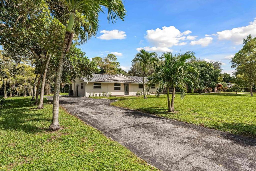 Photo of 4931 N Kay Street, Palm Beach Gardens, FL 33418 (MLS # R11129929)