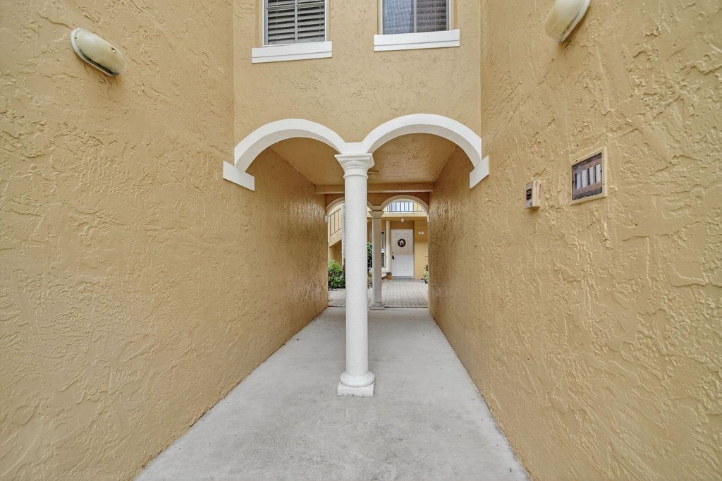 Photo of 1115 Lake Shore Drive #102, Lake Park, FL 33403 (MLS # F10531036)