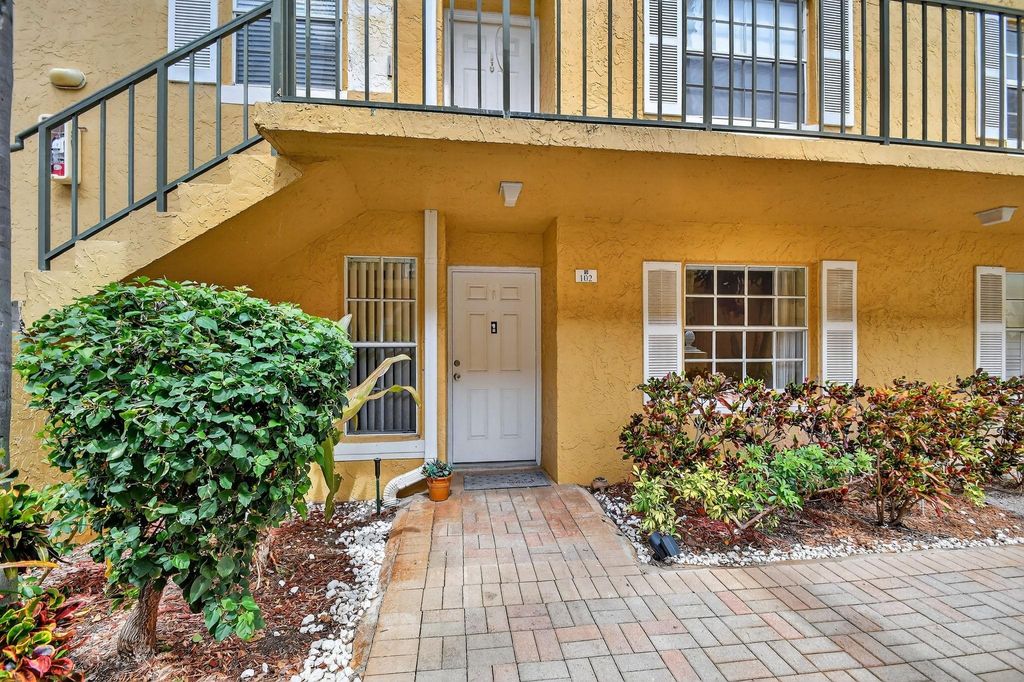 Photo of 1115 Lake Shore Drive #102, Lake Park, FL 33403 (MLS # F10531036)