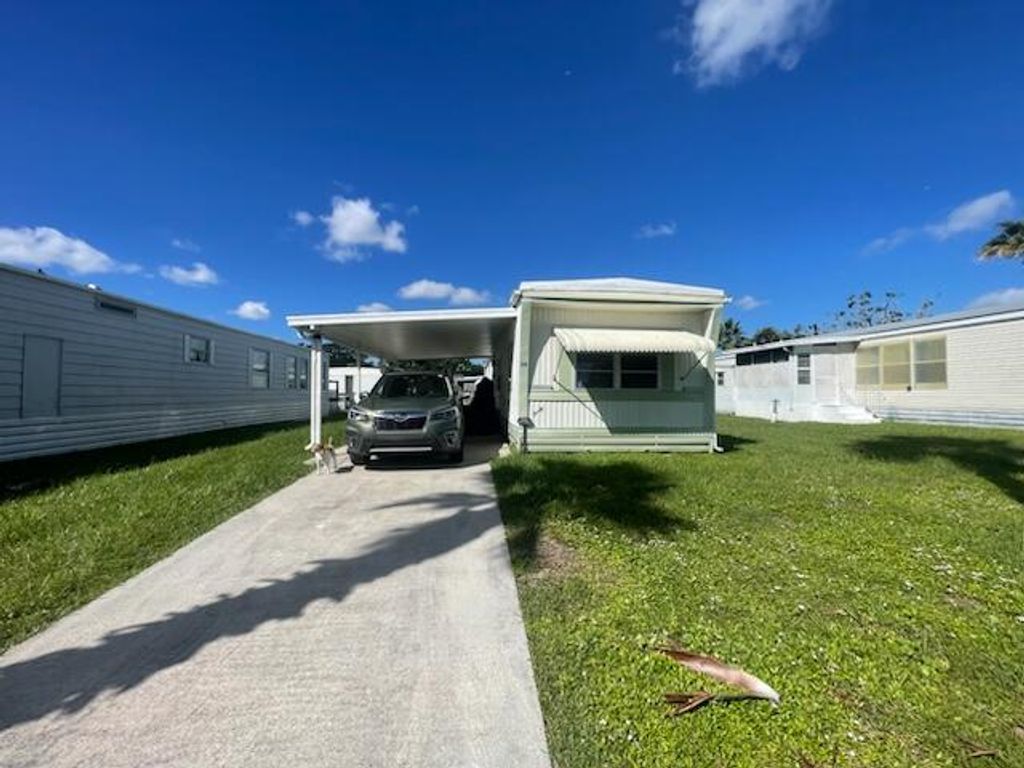 Photo of 30 SE Flamenco Way, Port Saint Lucie, FL 34952 (MLS # R11133815)