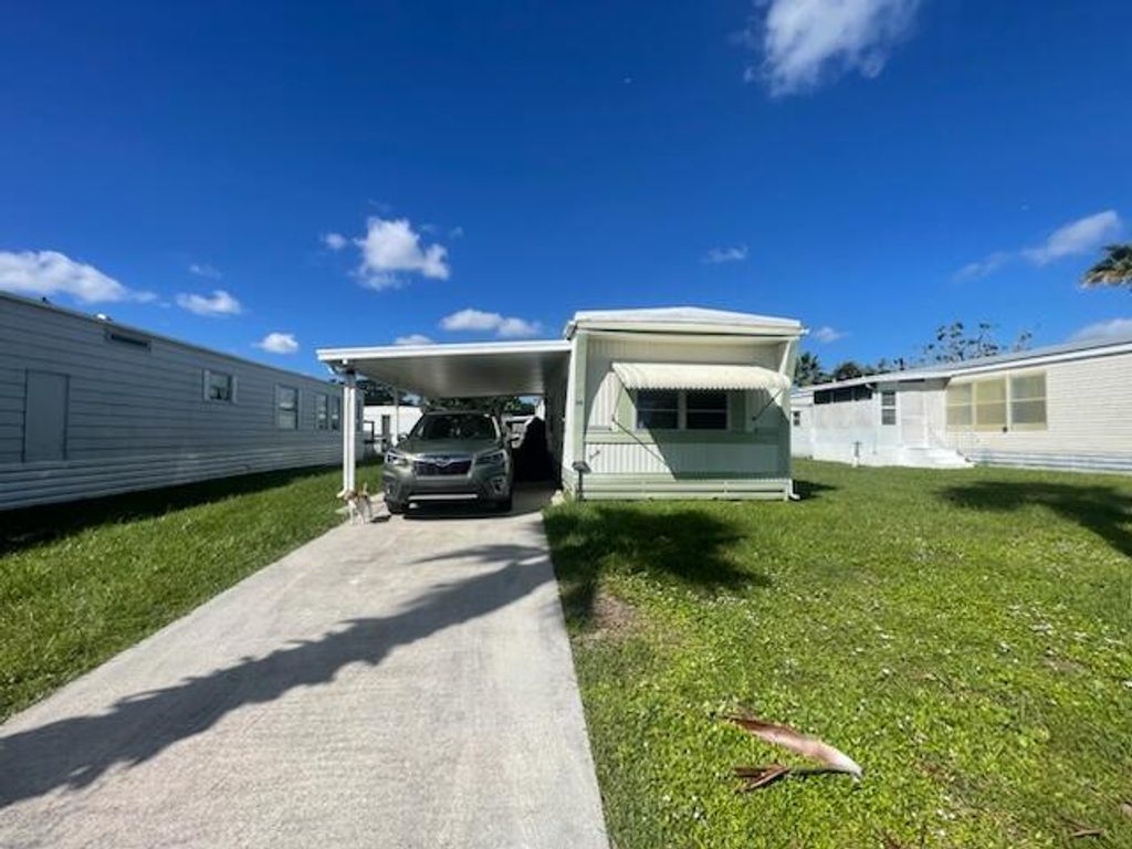 Photo of 30 SE Flamenco Way, Port Saint Lucie, FL 34952 (MLS # R11133815)