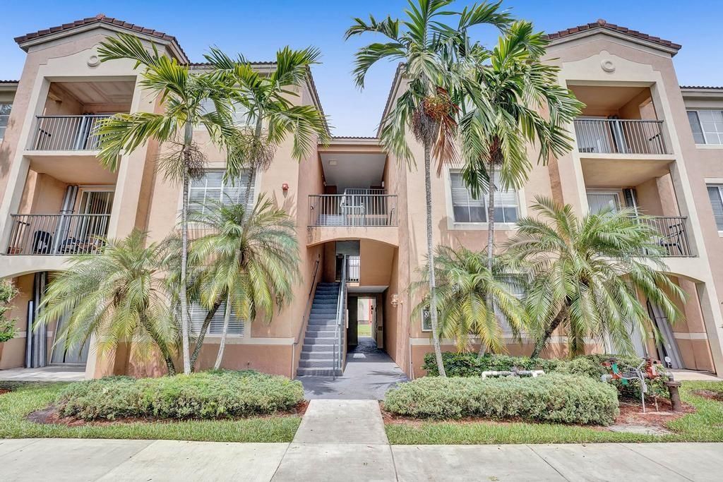 Photo of 8060 N Nob Hill Rd #304, Tamarac, FL 33321 (MLS # F10289974)