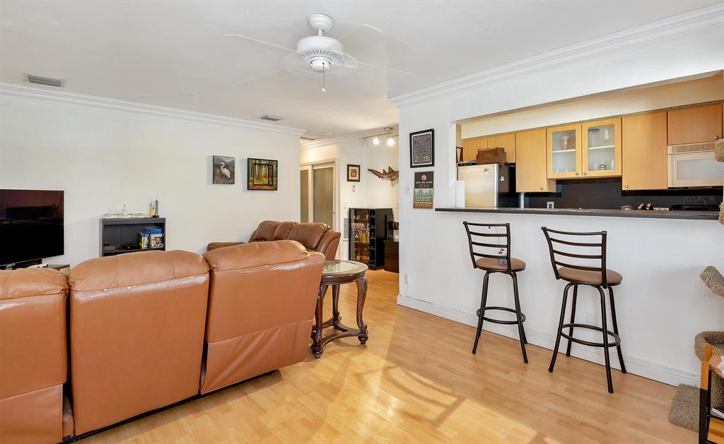 Well kept 1 bedroom 1 bathroom condo is located close to I-95, shops, and restaurants. You will find laminate floors throughout, a modern bathroom, kitchen, and one of the only units in the building with central A/C. Master closet has been outfitted with a closet system to help keep you organized. This a fantastic unit for you to call home!