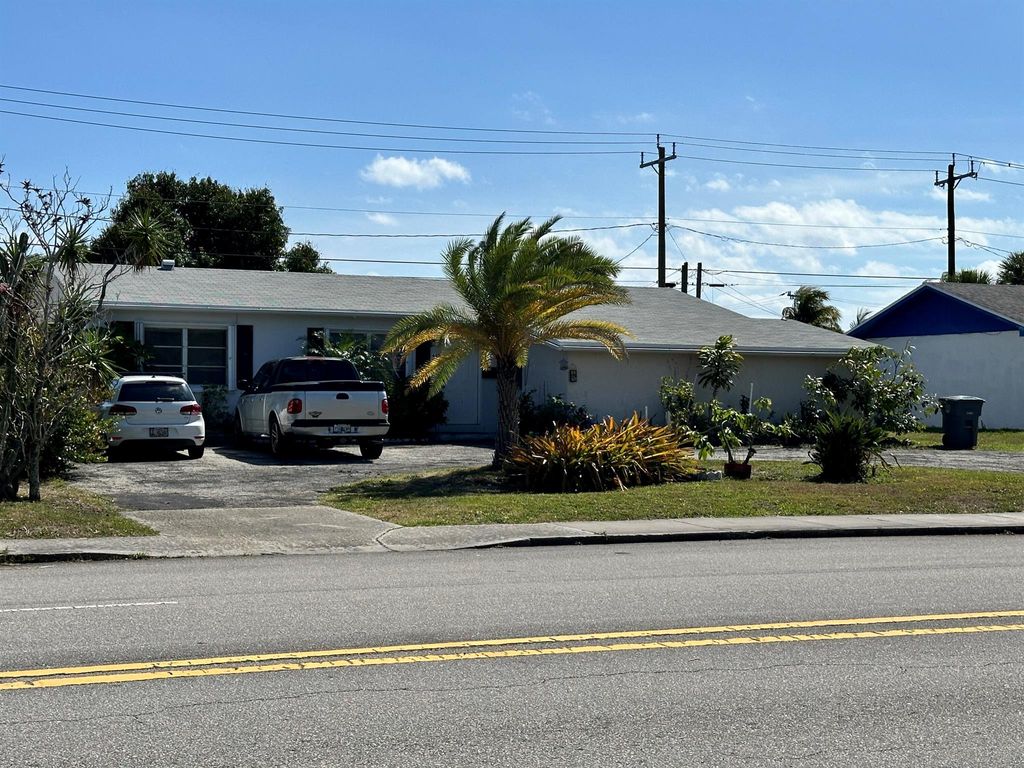 Photo of 640 Park Avenue, Lake Park, FL 33403 (MLS # R10973476)