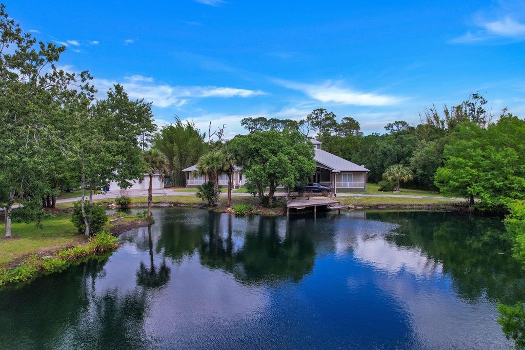 Photo of 7003 SW Wisteria Terrace, Palm City, FL 34990 (MLS # B26012479)
