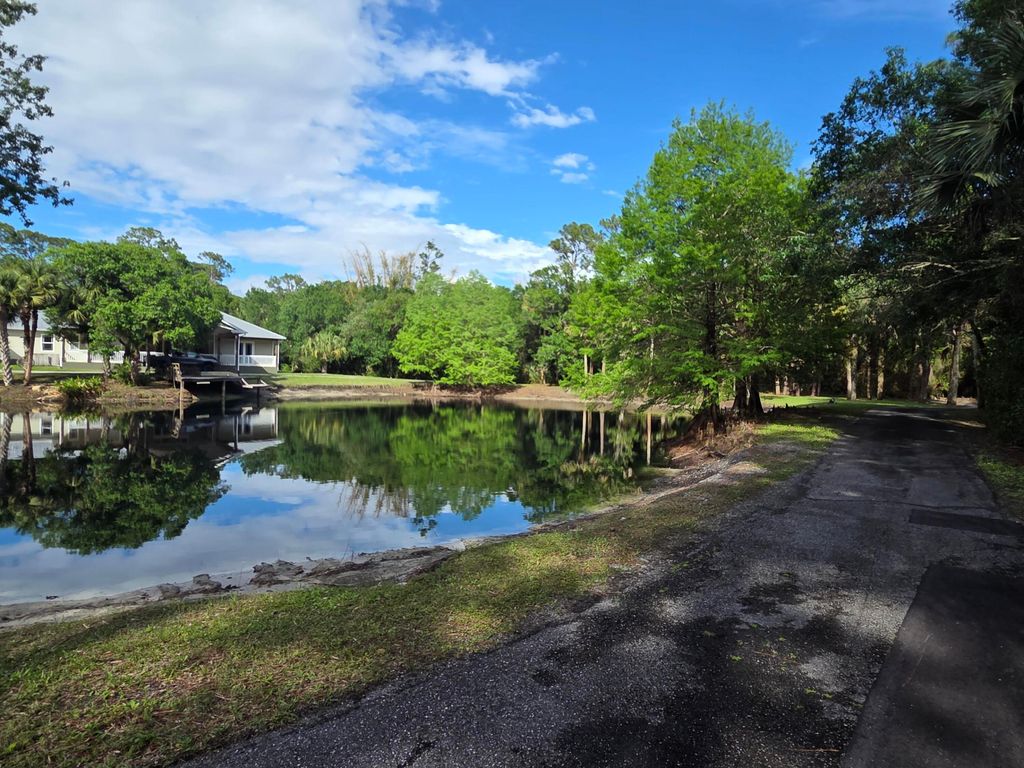 Photo of 7003 SW Wisteria Terrace, Palm City, FL 34990 (MLS # B26012479)