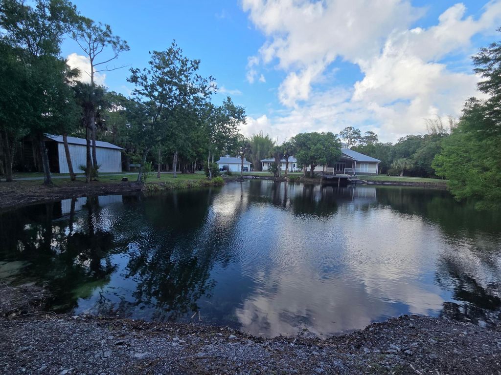 Photo of 7003 SW Wisteria Terrace, Palm City, FL 34990 (MLS # B26012479)