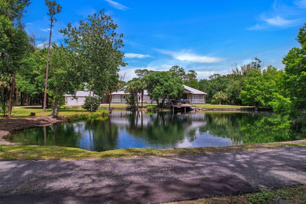Photo of 7003 SW Wisteria Terrace, Palm City, FL 34990 (MLS # B26012479)