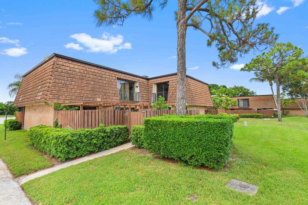 Photo of 2423 24th Lane, Greenacres, FL 33463 (MLS # B26055287)
