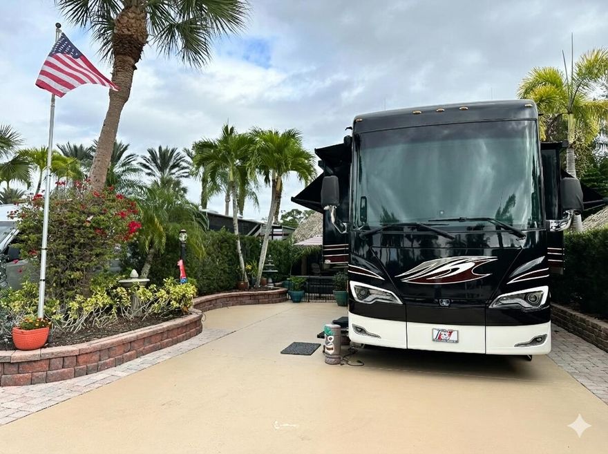 Likely the best deal at the resort! Now includes street legal lithium golf cart!  Located in the Motorcoach Resort St Lucie West, a class A resort.  Large L-shaped tiki with kitchen, granite topped bamboo bar with plenty of room for seating and entertaining. Isinglass roll down shades to protect from the elements.  Most furnishings to convey. Lot easily accommodates the largest of coaches and still room to park 2 vehicles and a golf cart.  Mature landscaping provides privacy.  Nearby greenspace for your pets. Close to front entrance of the resort.  Pad was just painted - Resort amenities include golf course, pools, hot tubs, tennis, pickleball, clubhouse and activities and events to many to mention! Owner is a licensed Florida realtor.
