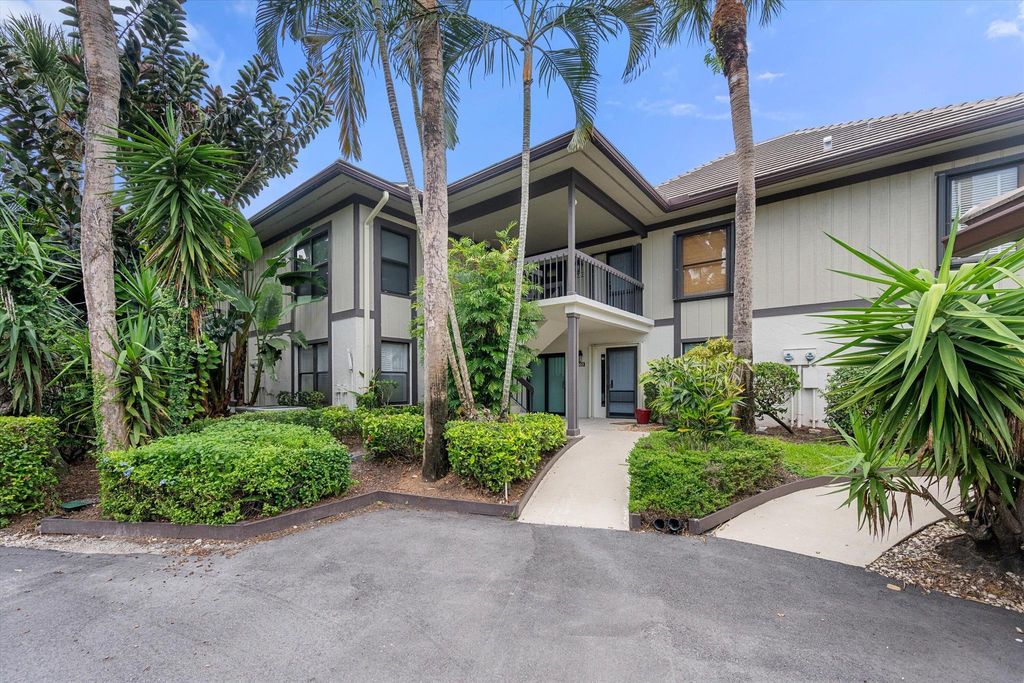 Photo of 13224 Polo Club Rd #A203, Wellington, FL 33414 (MLS # R11134574)
