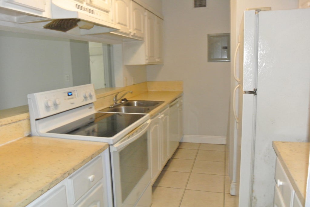 Photo of 4471 TREEHOUSE Lane #G, Tamarac, FL 33319 (MLS # B26083112)