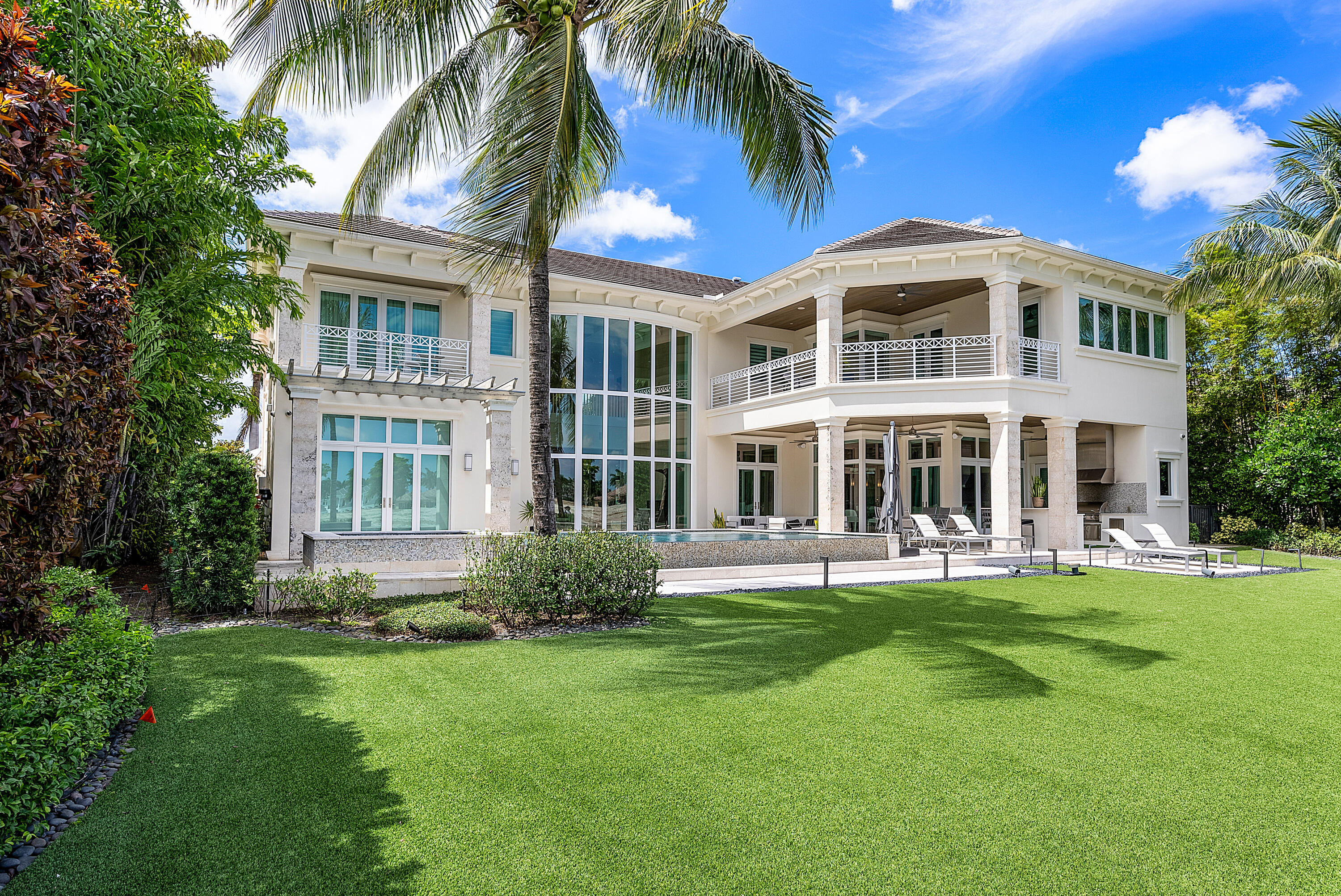 Located on one of the most spectacular lots in St. Andrews CC, this southern facing residence overlooks a double fairway and expansive lakes. Constructed in 2017, this stylish and bright home offers 5 bedrooms, a home theater, loft, 7 full and 1 half bathrooms and approximately 8,400 sq. ft. of living area.The spacious master suite encompasses nearly half of the second floor and features large, luxurious his and her closets, exquisite his and her baths, and phenomenal views of the golf course and lakes. A stunning gourmet chef's kitchen features top-of-the-line appliances and overlooks the pool and outdoor entertaining areas. All ancillary bedrooms are en suite and offer spacious walk-in closets. Extras include a whole house generator, 4-car garage, summer kitchen and elevator. Offered