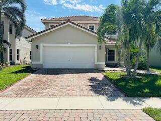 This beautiful 3-bedroom, 2.5-bath, two-story home in the heart of Greenacres offers the perfect blend of comfort and convenience. The spacious layout features an open living area filled with natural light, a modern kitchen, and a private backyard ideal for relaxing or entertaining. Located just moments from Palm Beach Airport the Florida Turnpike, and an array of shopping, dining, and entertainment options, this home makes everyday living easy and enjoyable. You are also just a short drive from Florida's stunning beaches and Downtown City Place where you can enjoy vibrant attractions. Don't miss this opportunity to own a well-maintained home in a prime location perfect for anyone seeking the best of South Florida living!