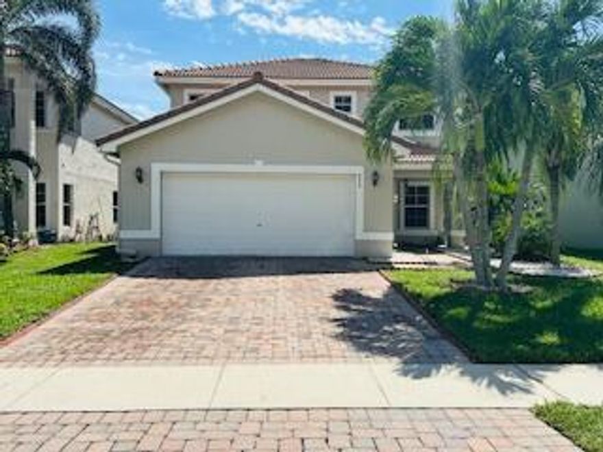 This beautiful 3-bedroom, 2.5-bath, two-story home in the heart of Greenacres offers the perfect blend of comfort and convenience. The spacious layout features an open living area filled with natural light, a modern kitchen, and a private backyard ideal for relaxing or entertaining. Located just moments from Palm Beach Airport the Florida Turnpike, and an array of shopping, dining, and entertainment options, this home makes everyday living easy and enjoyable. You are also just a short drive from Florida's stunning beaches and Downtown City Place where you can enjoy vibrant attractions. Don't miss this opportunity to own a well-maintained home in a prime location perfect for anyone seeking the best of South Florida living!