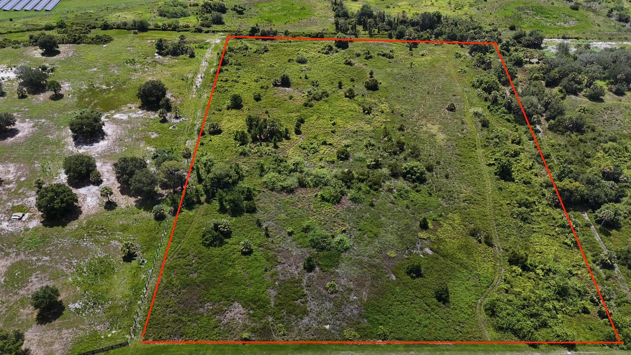 Build your custom dream home on 9.6 acres in the exclusive gated equestrian community of Sherman Wood Ranches. Enjoy the equestrian lifestyle with community bridle trails throughout and plenty of space to make this property the way you want. Downtown Okeechobee with restaurants, shopping and entertainment is a short 10 mile commute.