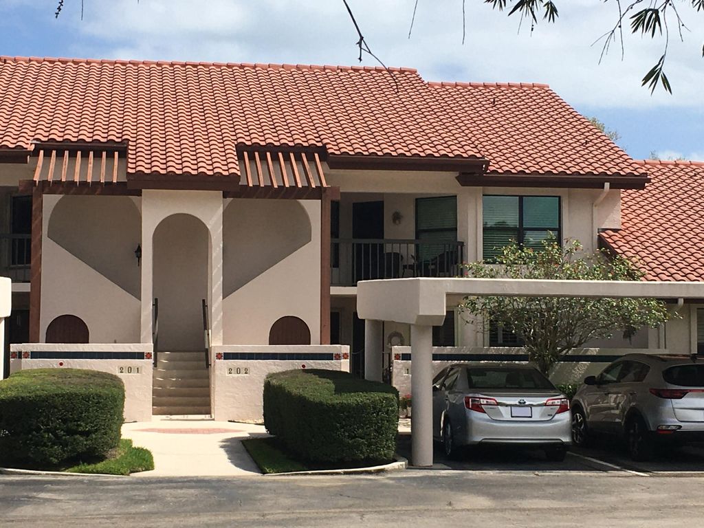 Photo of 6061 SE Martinique Drive #202, Stuart, FL 34997 (MLS # R10782348)