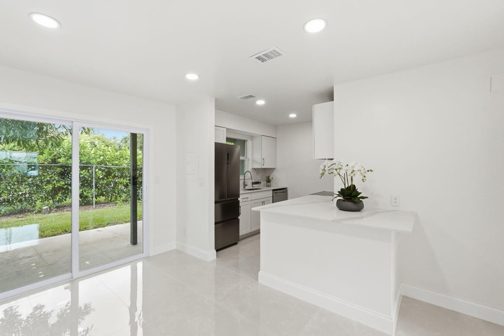 Photo of 6505 Dockside Circle, Greenacres, FL 33463 (MLS # B26045716)