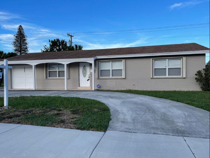 No HOA!! Renovated 3/2 home. Garage has been converted to into living area. Big Backyard! Minutes from the beach