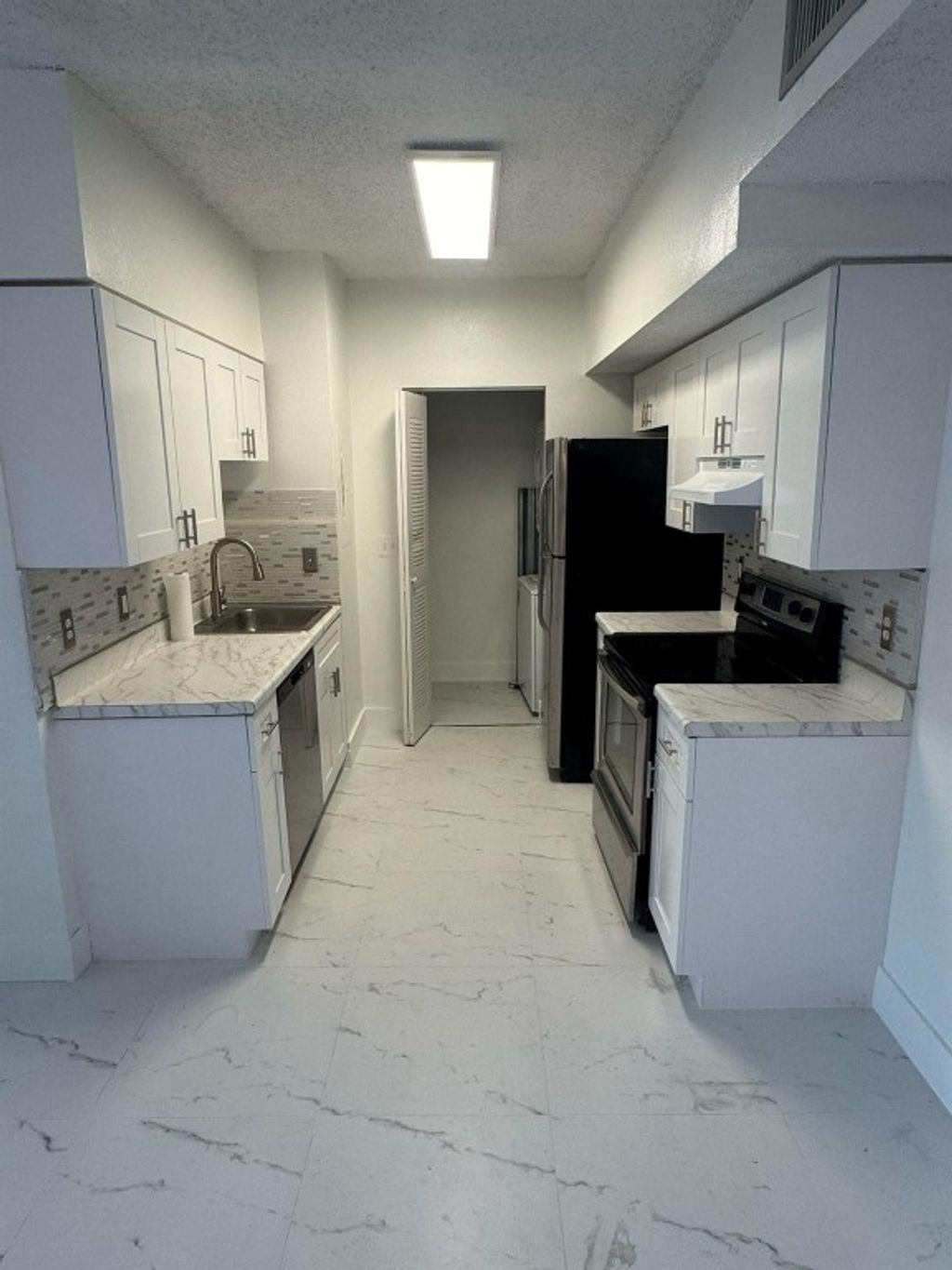 Photo of 3221 Sabal Palm Manor #105, Hollywood, FL 33024 (MLS # F10524794)