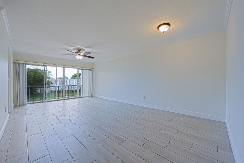 Photo of 1505 Crescent Circle #A8, Lake Park, FL 33403 (MLS # R11109756)